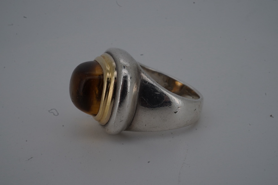 Paloma Picasso for Tiffany & Co., a citrine ring, set with a sugarloaf cabochon citrine, collet-set in bicoloured silver, size K, signed Tiffany & Co. and Paloma Picasso, British hallmarks for silver, pouch stamped Tiffa